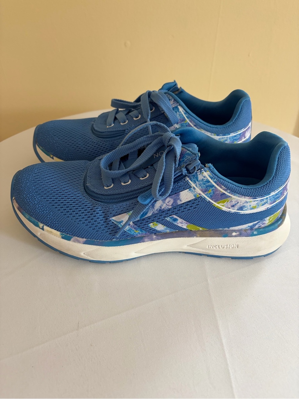 Billy’s Blue Athletic Sneakers with Floral Accent Trim and zip up closure